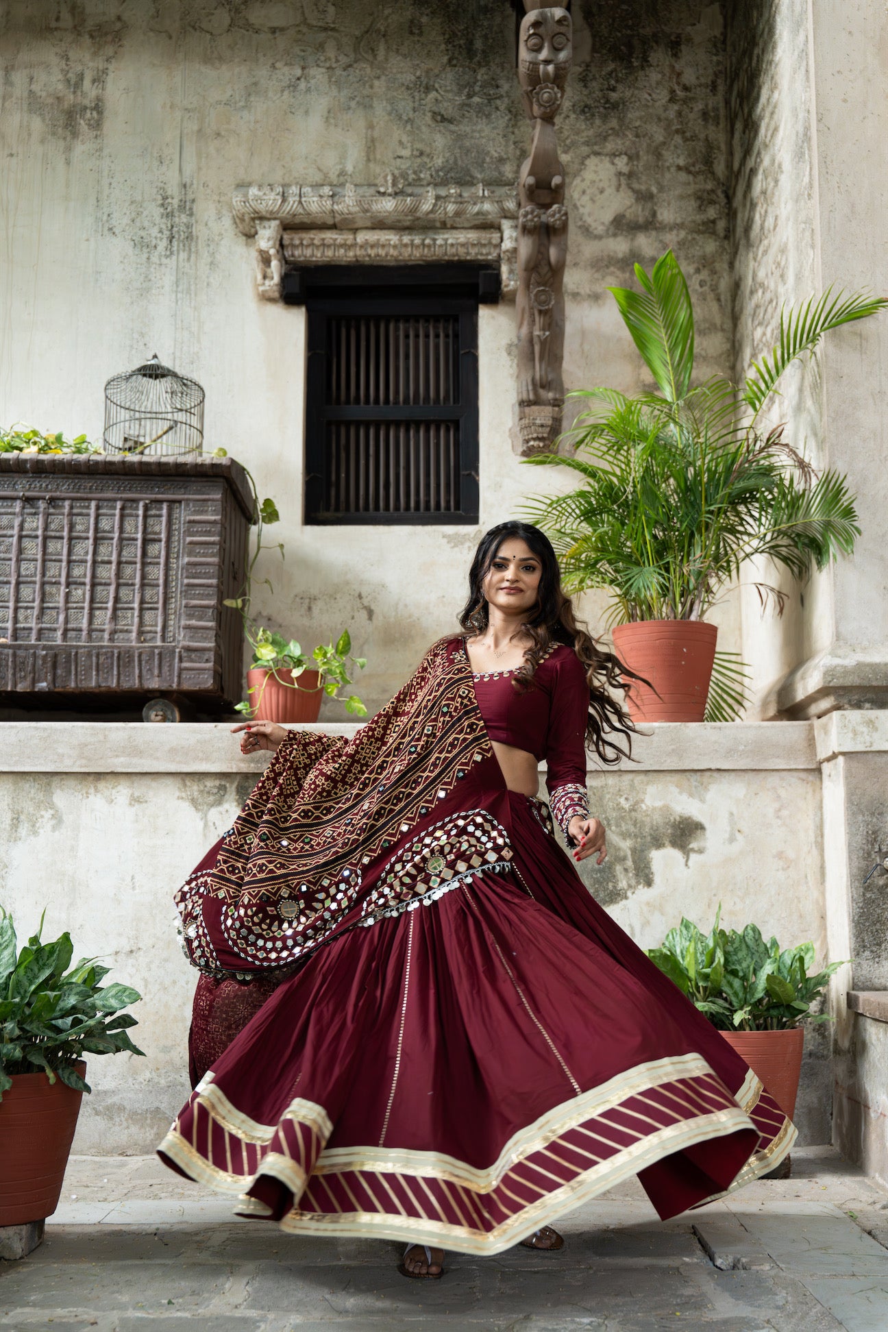 Maroon Mul Cotton Navratri Lehenga Set with Handcrafted Patola Dupatta and Mirror Work Blouse|RAAS