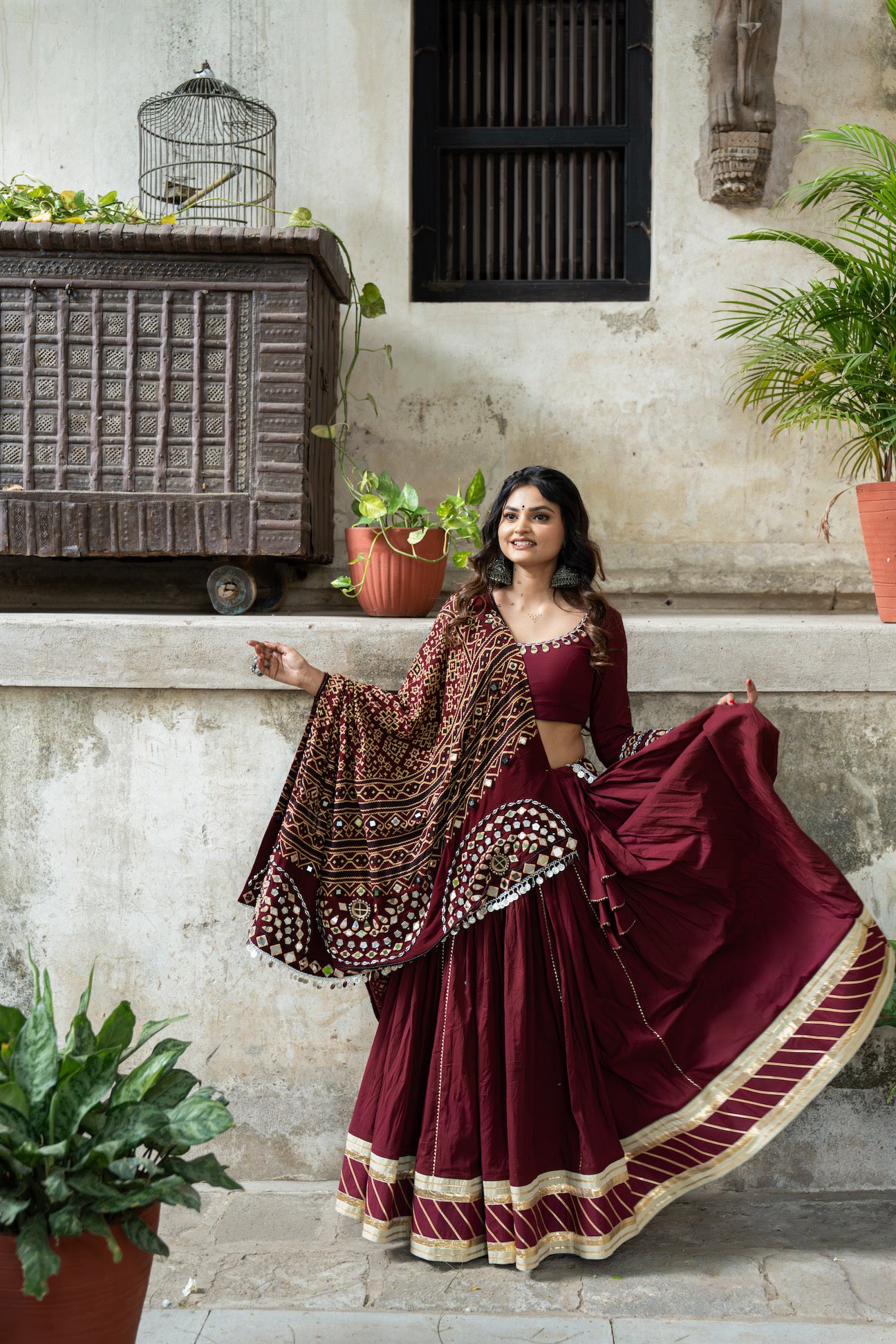 Maroon Mul Cotton Navratri Lehenga Set with Handcrafted Patola Dupatta and Mirror Work Blouse|RAAS