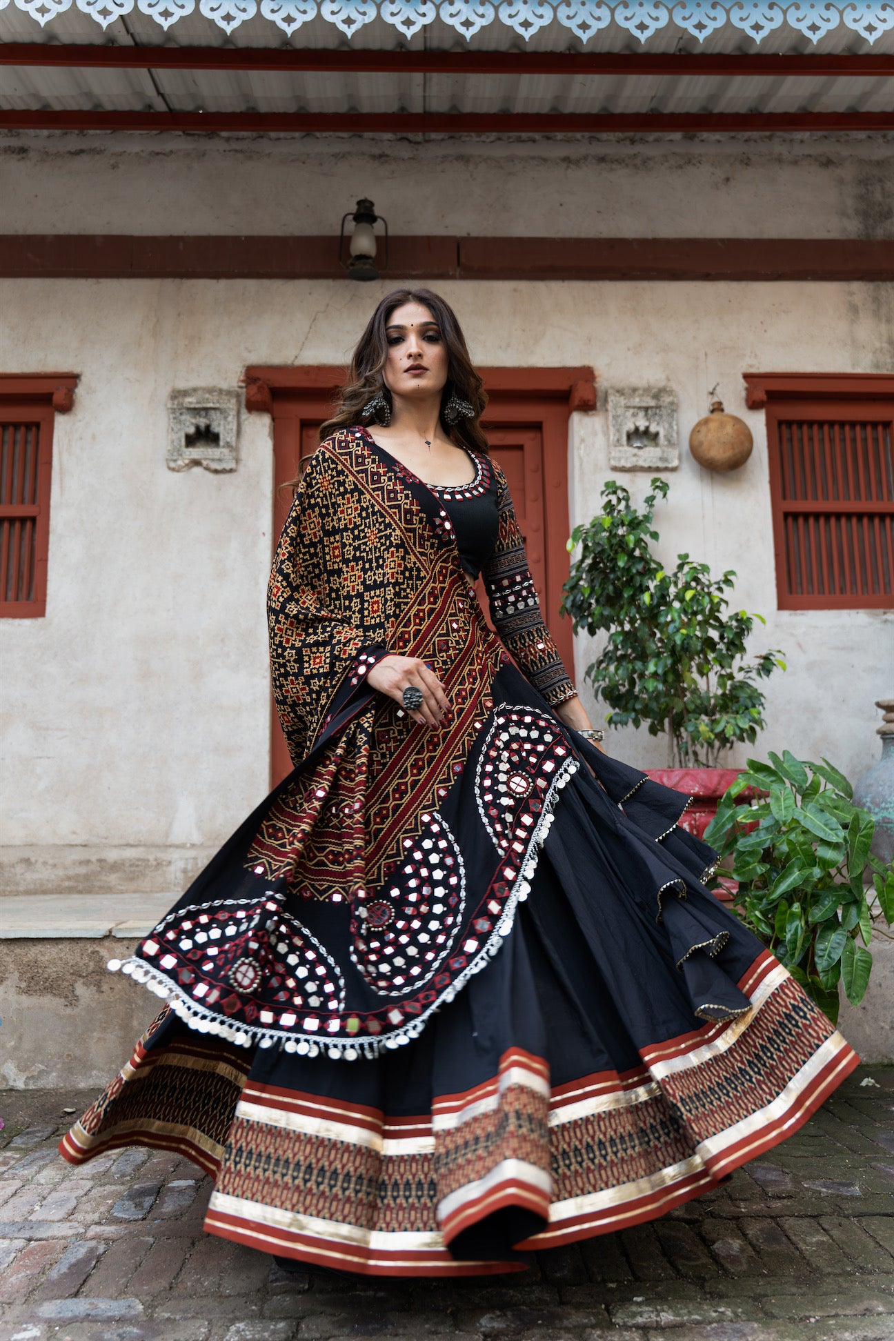 Black Mul Cotton Navratri Lehenga Set With Patoda Mirrorwork Dupatta & Hand-Embroidered Blouse|RAAS