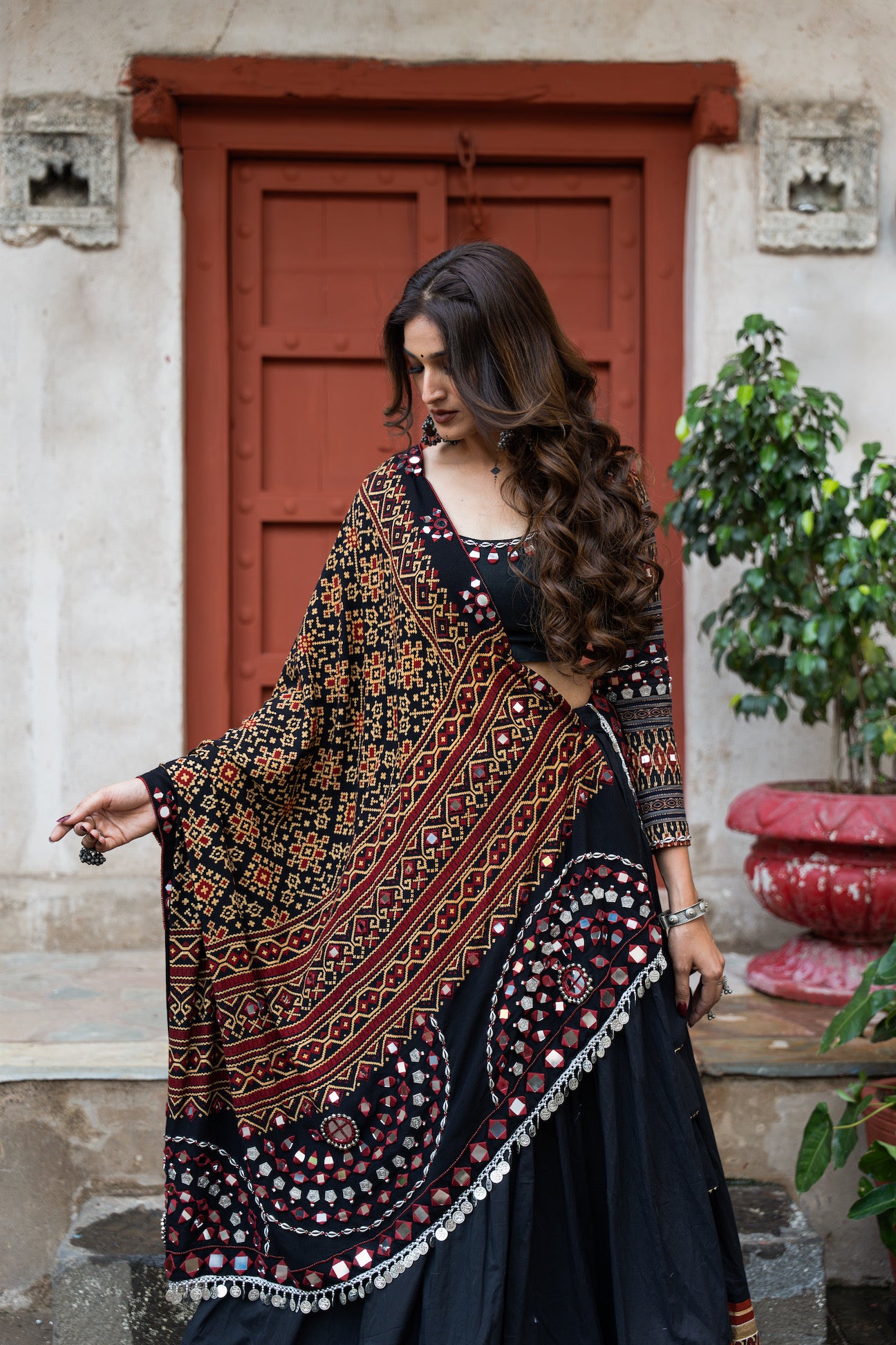 Black Mul Cotton Navratri Lehenga Set With Patoda Mirrorwork Dupatta & Hand-Embroidered Blouse|RAAS