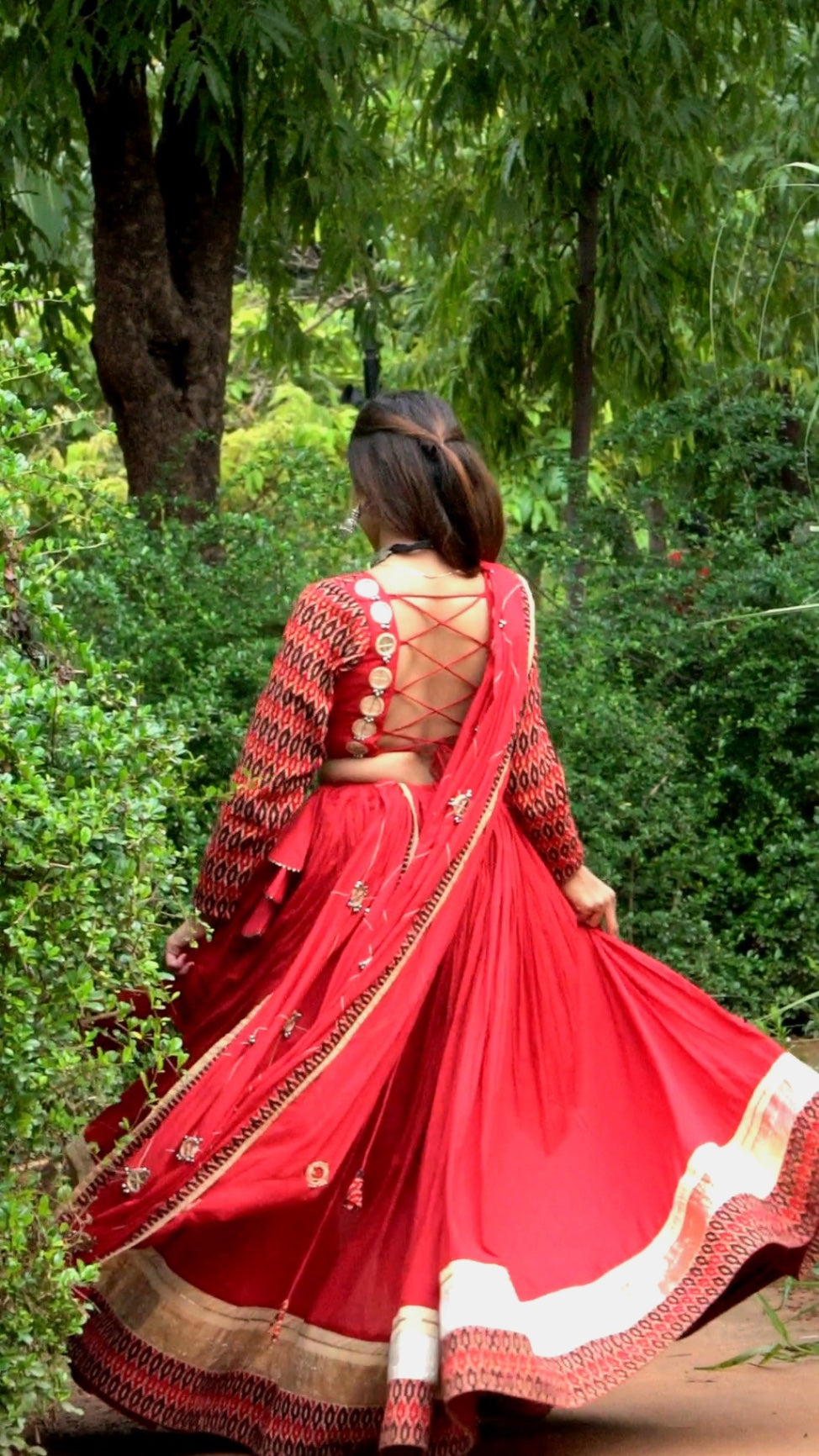 Red Ikat Navratri Chaniya Choli with Mirror Work – 12 Meter Flare | 2025 Collection