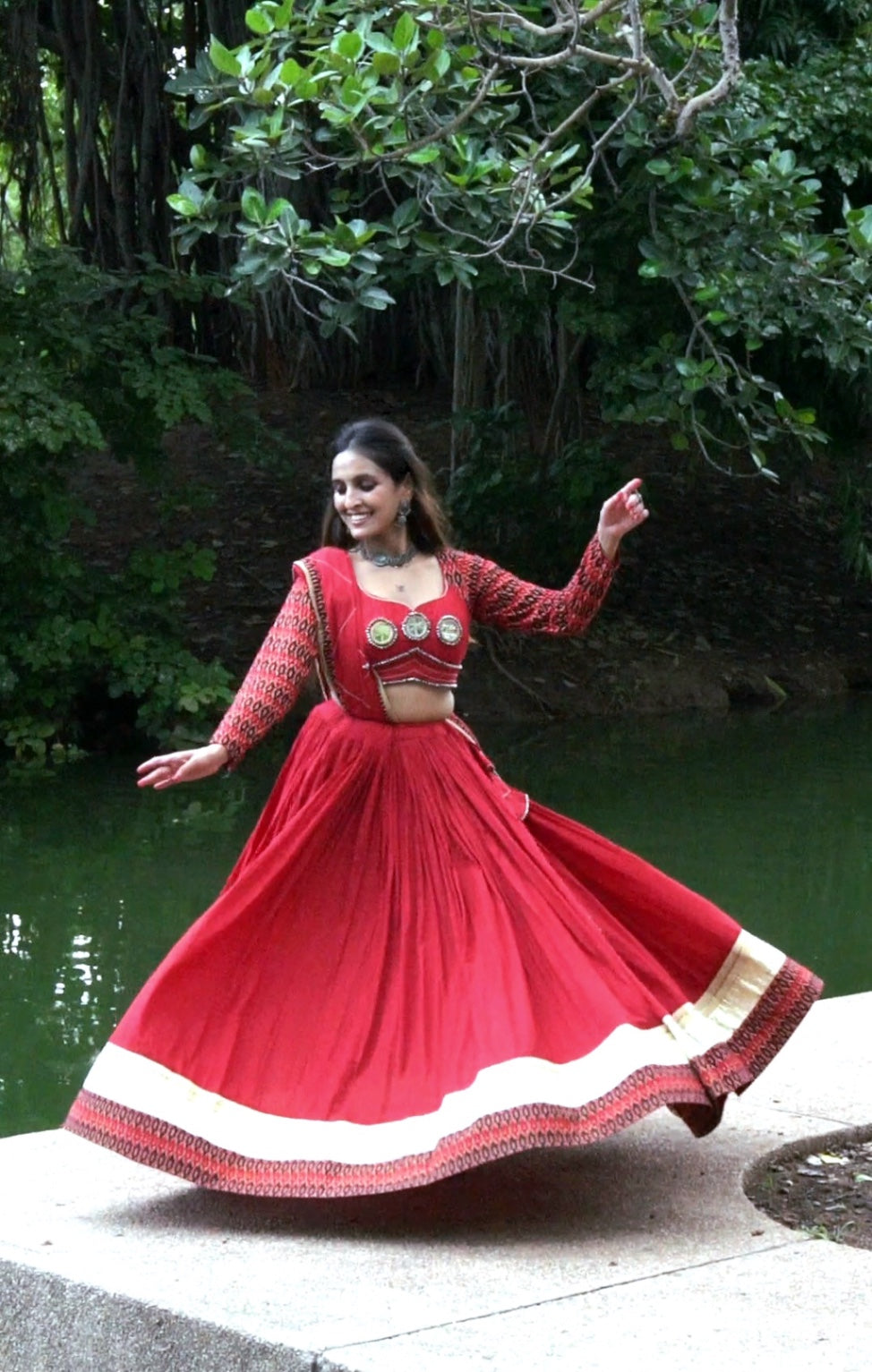 Red Ikat Navratri Chaniya Choli with Mirror Work – 12 Meter Flare | 2025 Collection