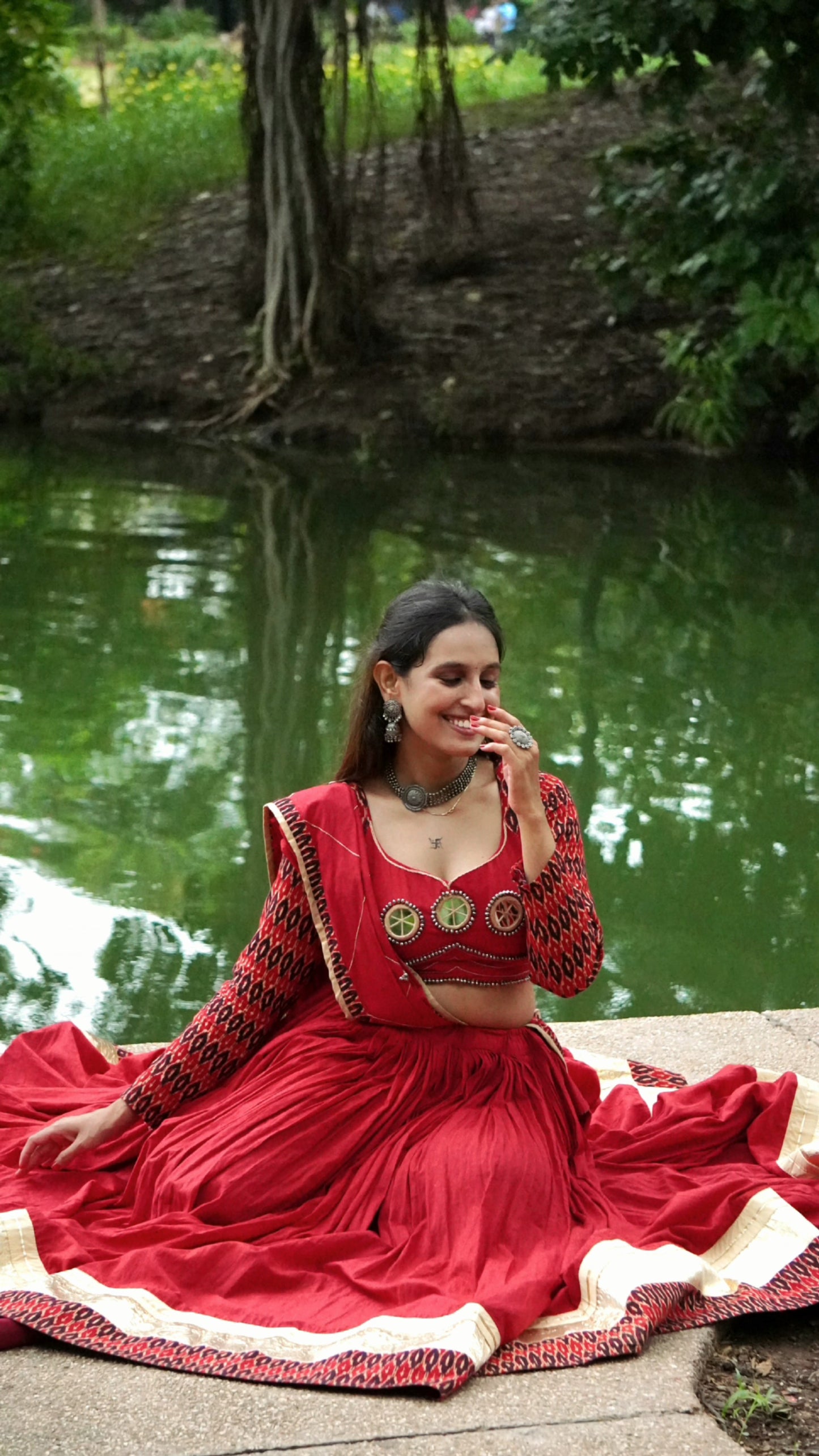 Red Ikat Navratri Chaniya Choli with Mirror Work – 12 Meter Flare | 2025 Collection