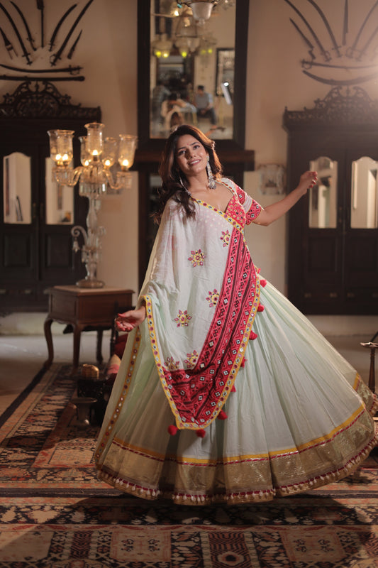 Pista Elegance: Navratri 2025 Mul Cotton Skirt Set with Patola Mirror Blouse & Daman Dupatta