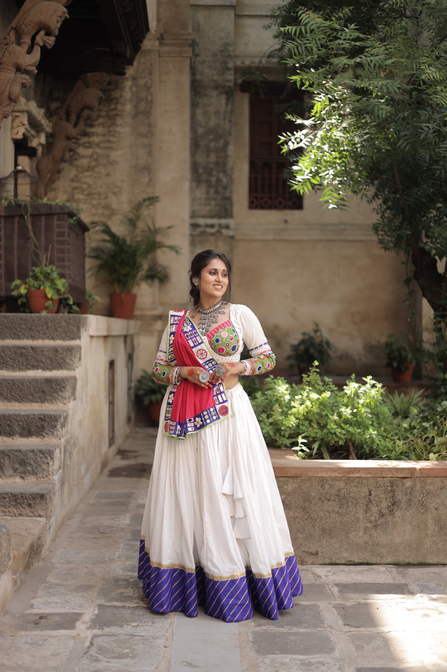 Kutch Heritage White Navratri Lehenga Set with 10-Meter Flare & Rani Pink Statement Handcrafted Dupatta - Raas 2025