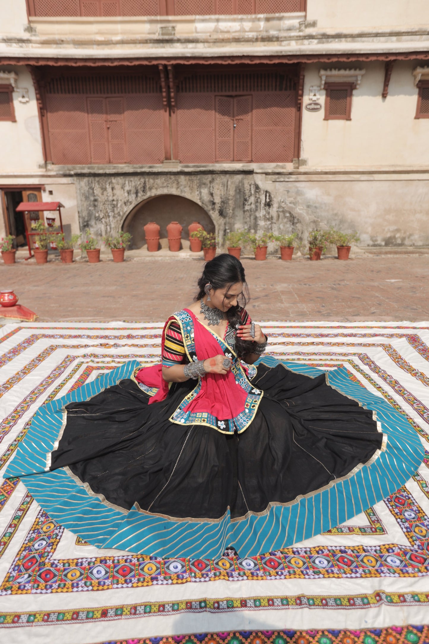 Kutch Heritage Black Navratri Lehenga Set with Blue Hemline & Rani Pink Statement Handcrafted Dupatta - Raas2025