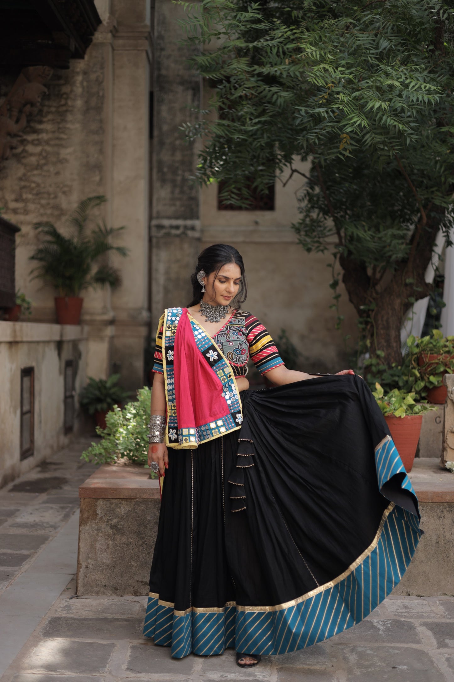 Kutch Heritage Black Navratri Lehenga Set with Blue Hemline & Rani Pink Statement Handcrafted Dupatta - Raas2025
