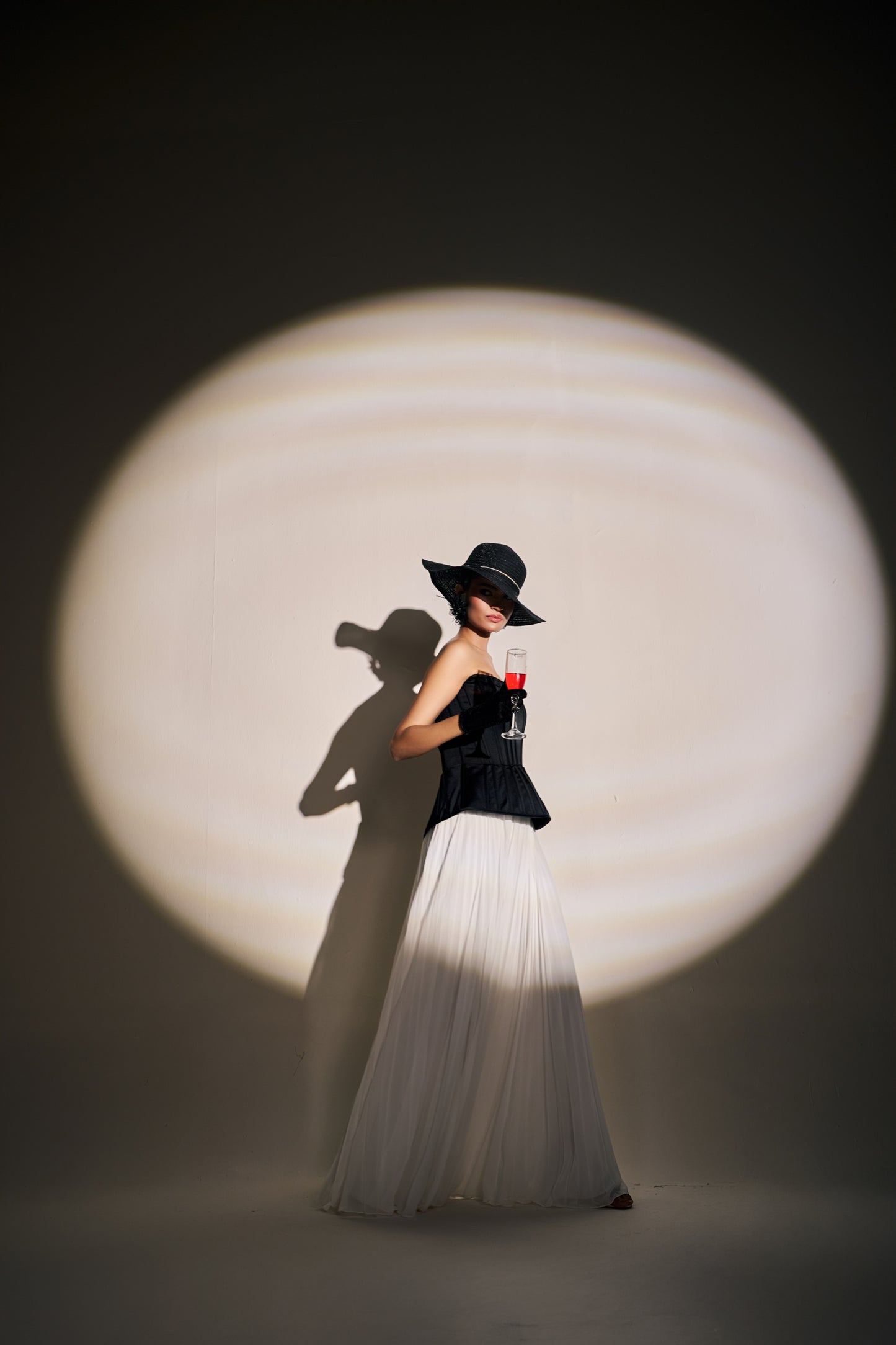 Black Sculpted Corset Gown with Ivory Pleated Fall | Modern Luxury Evening Wear