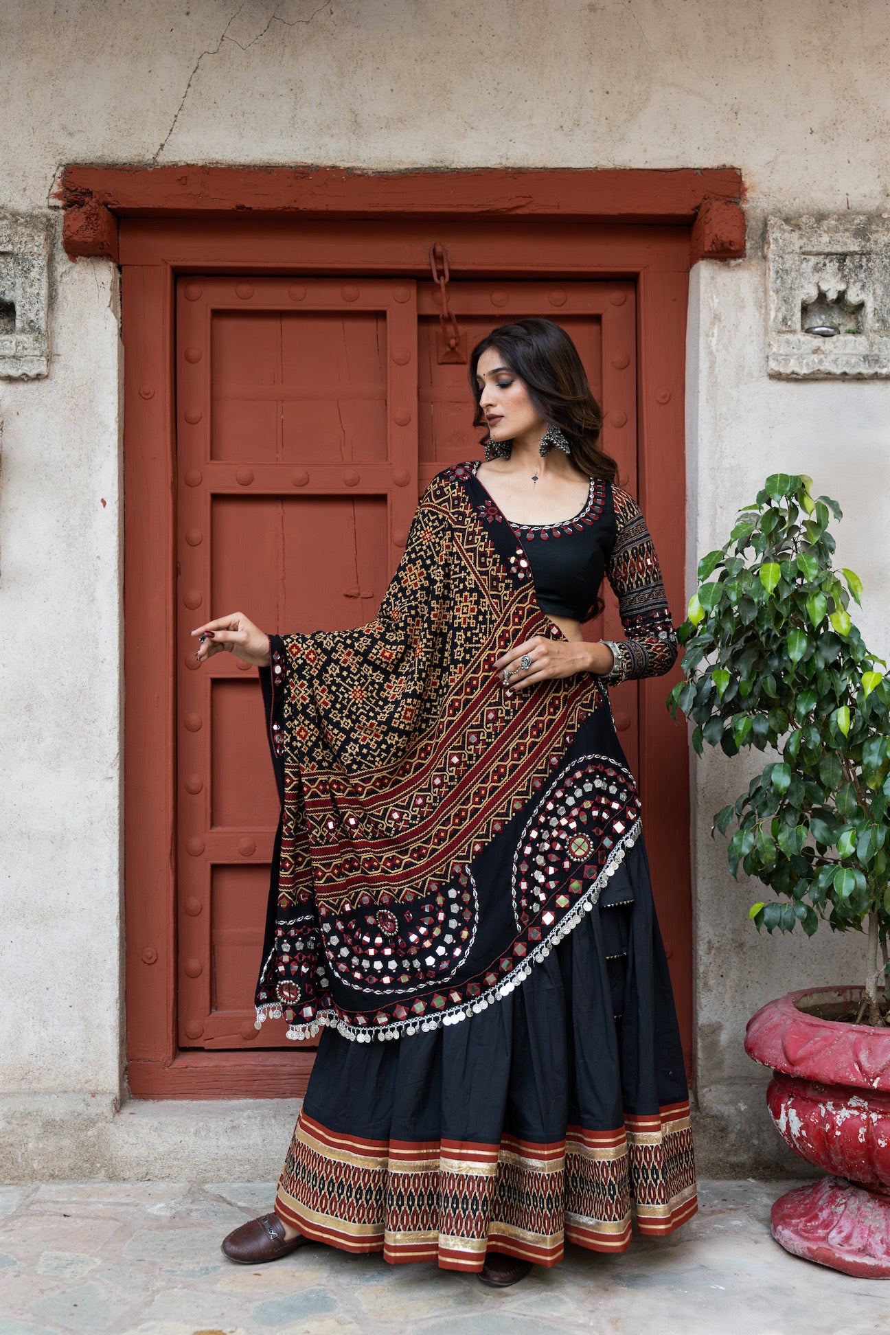 Black Mul Cotton Navratri Lehenga Set With Patoda Mirrorwork Dupatta & Hand-Embroidered Blouse|RAAS
