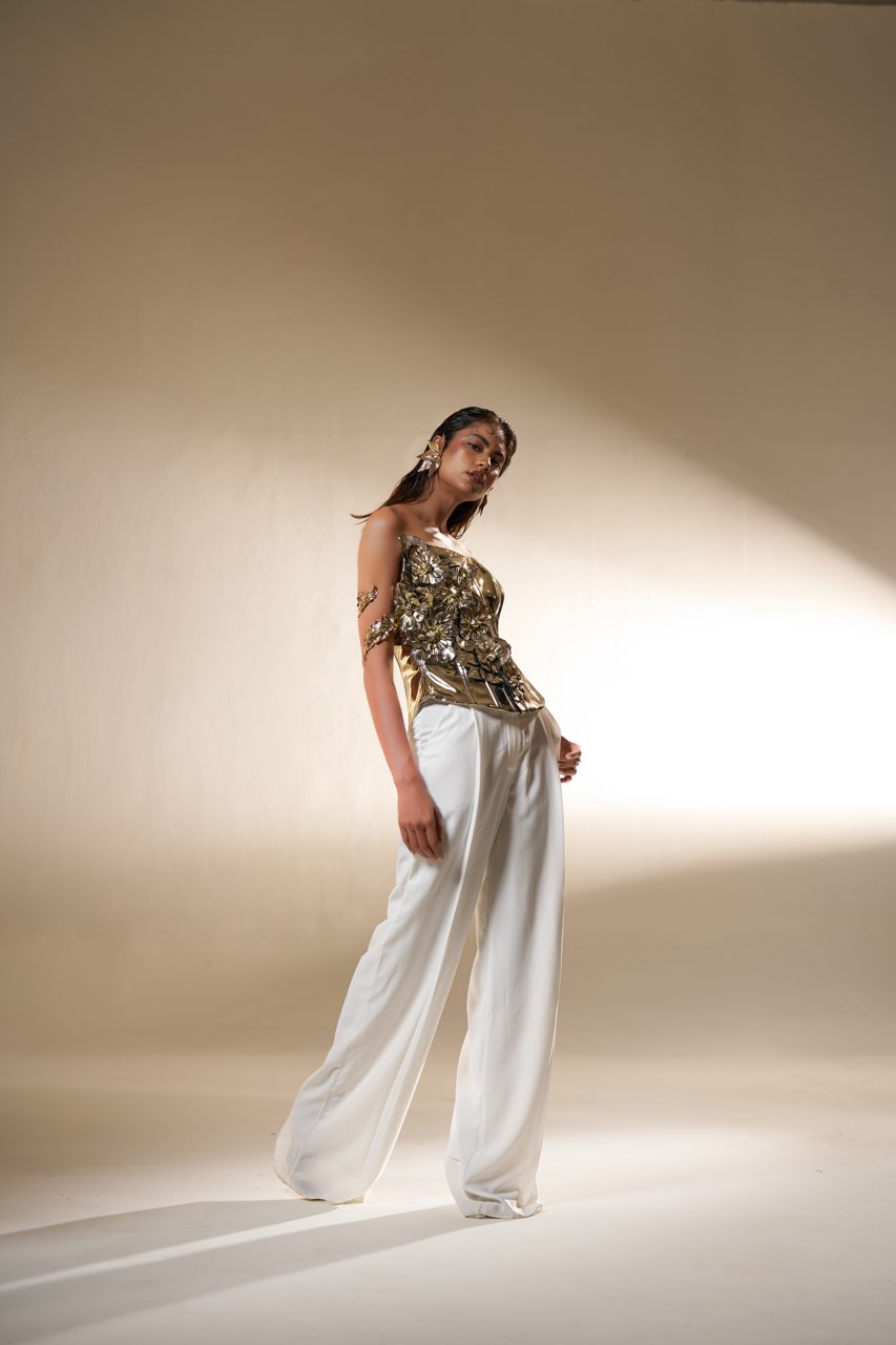 Gold Sculpted Corset Top with Ivory Wide-Leg Pants – Modern Luxury Wear