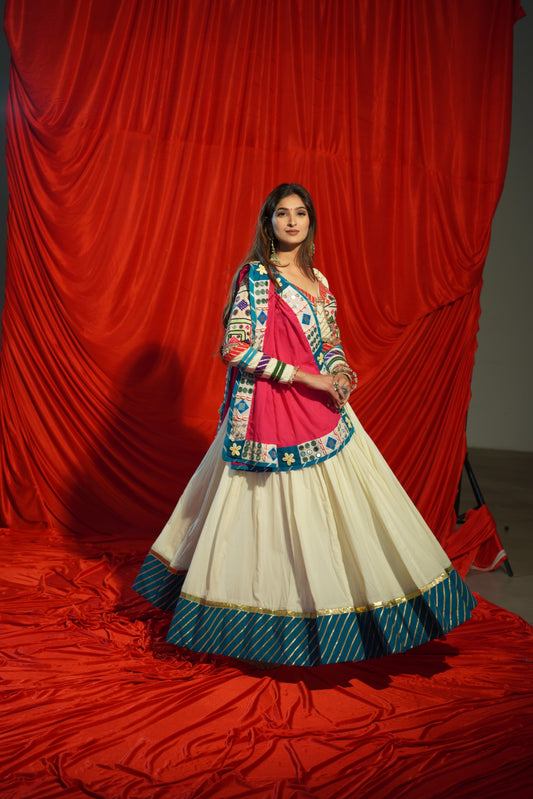 White Mul Cotton Chaniya Choli with Heritage Kachhi Work Blouse & Mirror-Coin Handcrafted Dupatta – Navratri Raas Collection 2025